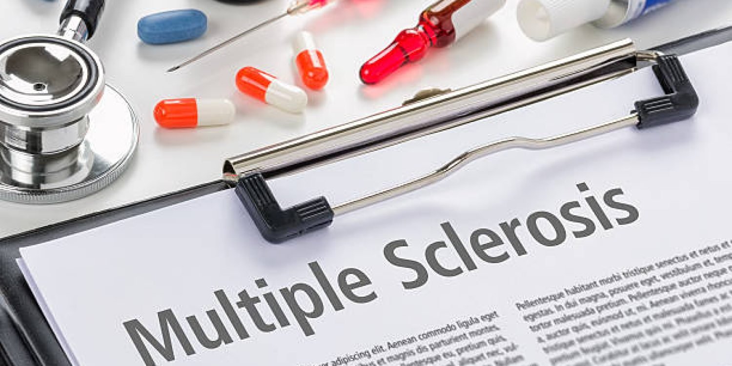 The diagnosis Multiple Sclerosis written on a clipboard